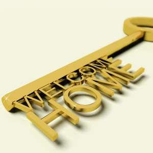 Key With Welcome Home Text As Symbol For Property And Ownership